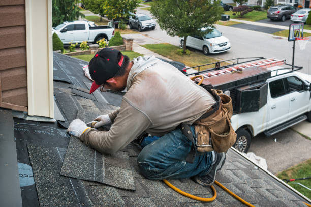 Professional Flat Roof Repair technician working in New Point, VA
